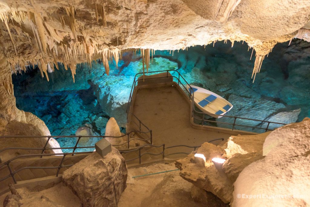 Boat in blue water, Crystal Caves, Fantasy Cave, Bermuda